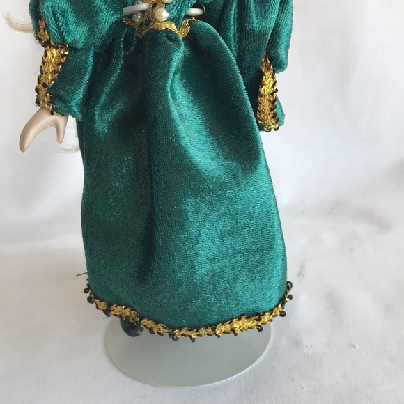 Vintage 8” porcelain doll with green dress on display stand - Picture 3 of 7